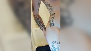 Ametuer Milf plays with her soak cunt. Solo redheaded inked MILF play.