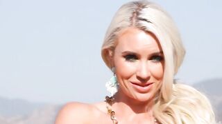 Blonde Gigi Allens is pose and masturbating under the sun