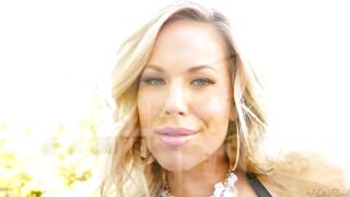 View Olivia Austin slips down her bikini and teases you with her huge titties