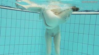 Nastya undresses Libuse into the pool like a dyke