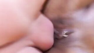 African MILF is on her knees sucking off two dicks and getting boned