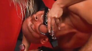 Blonde domina ties up and gags dude as she slips rat trap