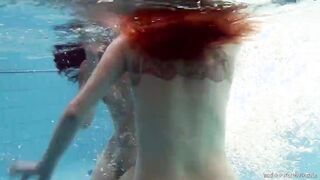 Fun nude girls got sensual into the pool