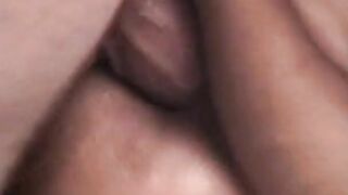 Cougar on the bed blows on a dick