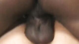 Slim Cutie is licking her boobs while african guy fucks her