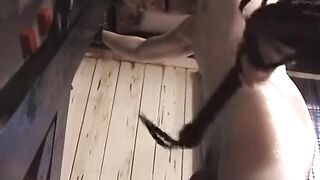 Redheaded fetish chicks into rubber whack and paddle dude's butt