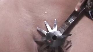 Blonde with long breasts submits to burning wax inside dungeon