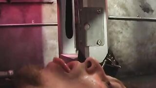 Broad punishes submissive guy on St. Andrews cross