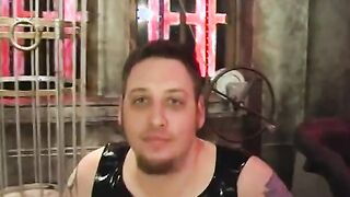Broad punishes submissive guy on St. Andrews cross
