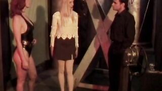 Hottie blonde is tied into red and has clamps applied by sadist