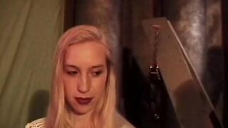 Hottie blonde is tied into red and has clamps applied by sadist
