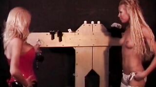 Dom into rubber spanks and twat clamps submissive thot