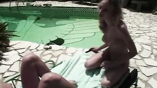 Bombshell blonde lesbo fucks her friend with a strap on