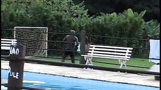 Young cocksucker blows and fucks ebony penis by the pool