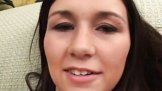 Adorable dark hair moans while stud pounds her butt on the sofa