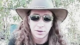 Hippie guy fucks ponytailed blonde doggy-style as second