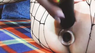 Deepthroats a long ebony toy and finishes by fucking vagina