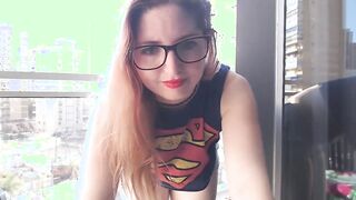 Supergirl Dressed flashing melons inside balcony