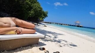 Without underwear on Beach babe touching vagina
