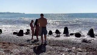 four men plowed a women on the beach