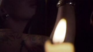 Women inside underwear screwed each other into bed by candlelight