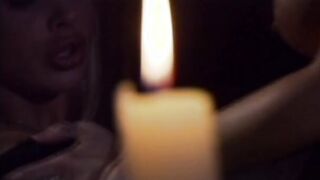 Women inside underwear screwed each other into bed by candlelight