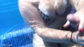 Long titties bimbo gives pretty hand job inside hotel pool - risky :P