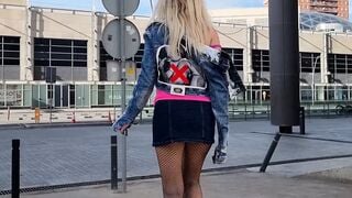 Curvy into ripped stockings walking and performance her booty outdoors