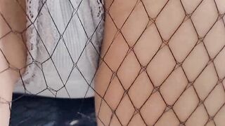 Curvy into ripped stockings walking and performance her booty outdoors