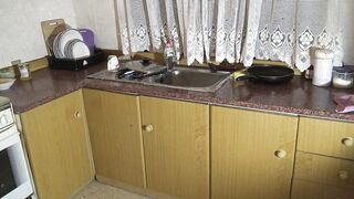 This young women is stuck into the kitchen