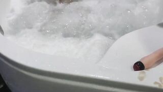 bitch having fun into the jacuzzi