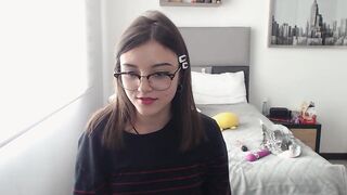 Latin geek chick with glasses into her first days as a web cam g
