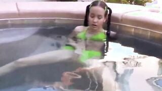 Small Tabby Masturbating her twat using vibrator at the pool