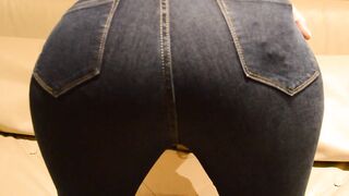 Pretty butt inside dark blue jeans