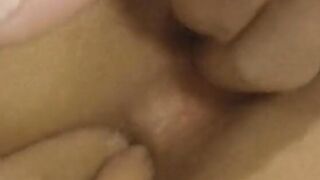 Crazy dark haired has a penis into her vagina and a sex toy into her butt inside an