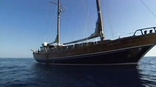 Smoking Bombshell dark haired hoe gets double penetrated on a yacht