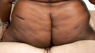 African BBW with a stunning face plays with a sex toy before getting fuck by a stud