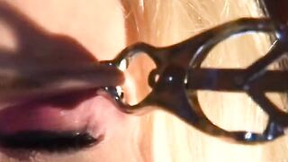 Submissive blonde is made to suck a man's penis public the room