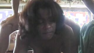 Voluptuous african woman with huge bristols blows white penis staying on her knees