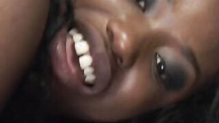 Ebony pornstar with gag ball changes sex toy to penis for anal plowed