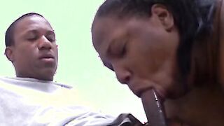 African BBW dark hair bends over to suck bro's rough penis on the couch
