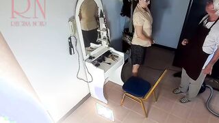 Camera inside naked barbershop. Hairdresser makes undress lady ho cut her hair. Barber, nudism. WEBCAM two