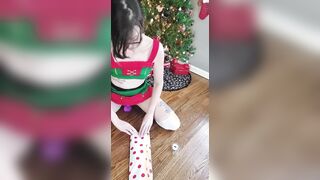 Erotic elf wrapping gifts four santa