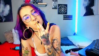 Crazy Sexy nerdy Colombian with purple hair gets out of control into her cam performance spitting on