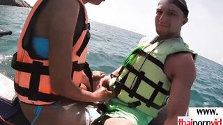 Petite amateur Thai barely legal Cherry giving head on a jet ski outside