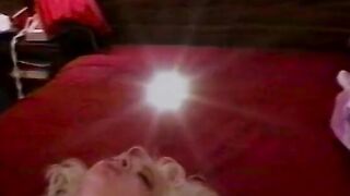 Blonde whore strokes her long boobies while she's rides her bf's penis