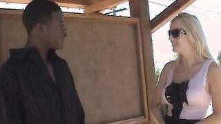 Blonde Hottie gets the chocolate long stick to suck on