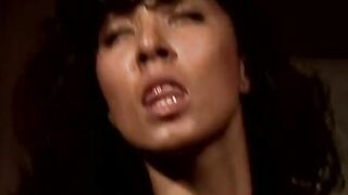 Classic dark hair with long boobies blows and fucks dudes by the vehicle