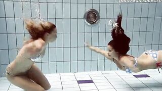 Iva and Paulinka enjoy swimming together