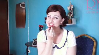 Red lipstick making out pose by Regina Noir.